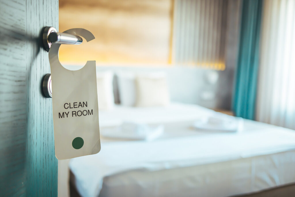 Opened Door Of Hotel Room.